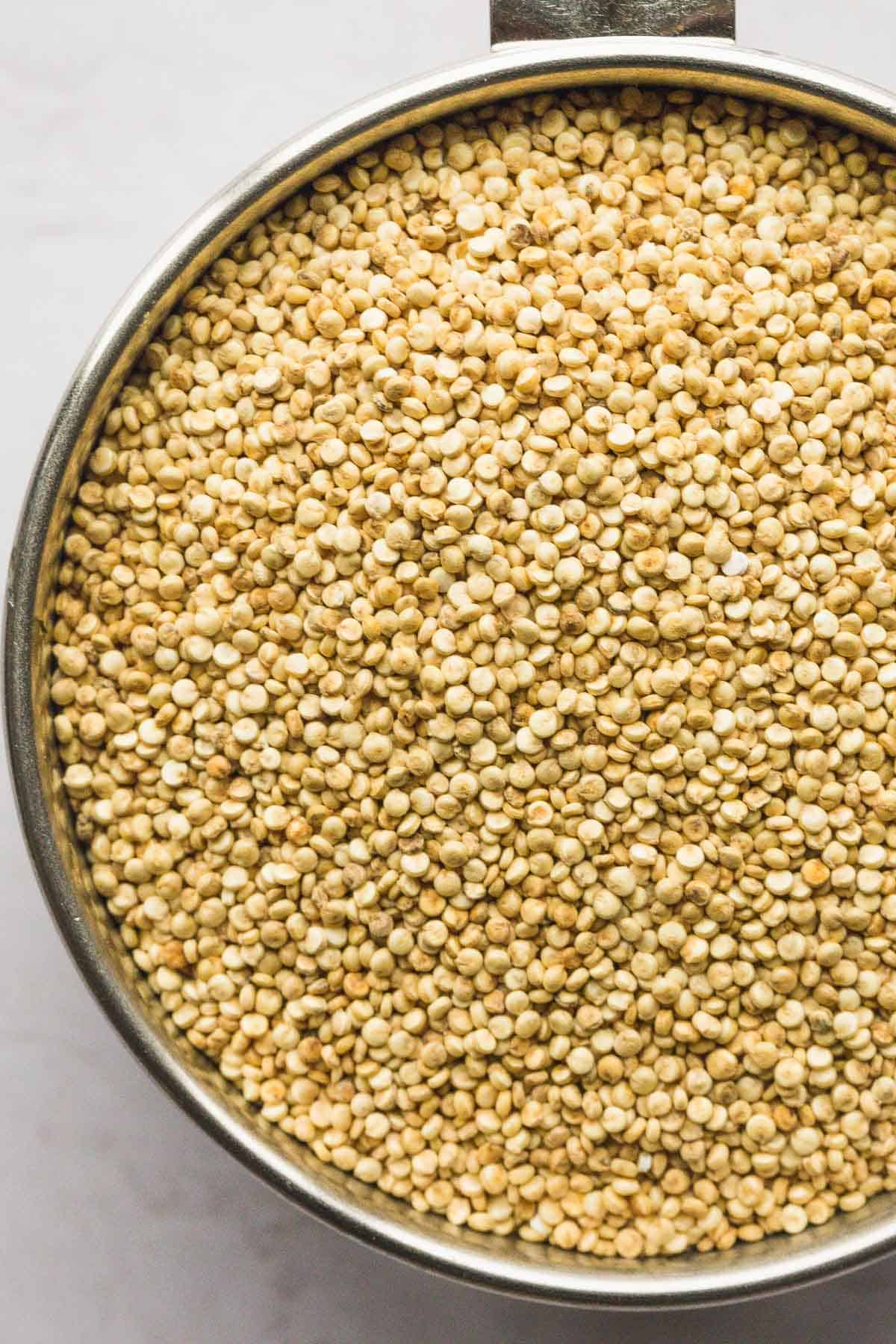 A close up of dried quinoa seeds 