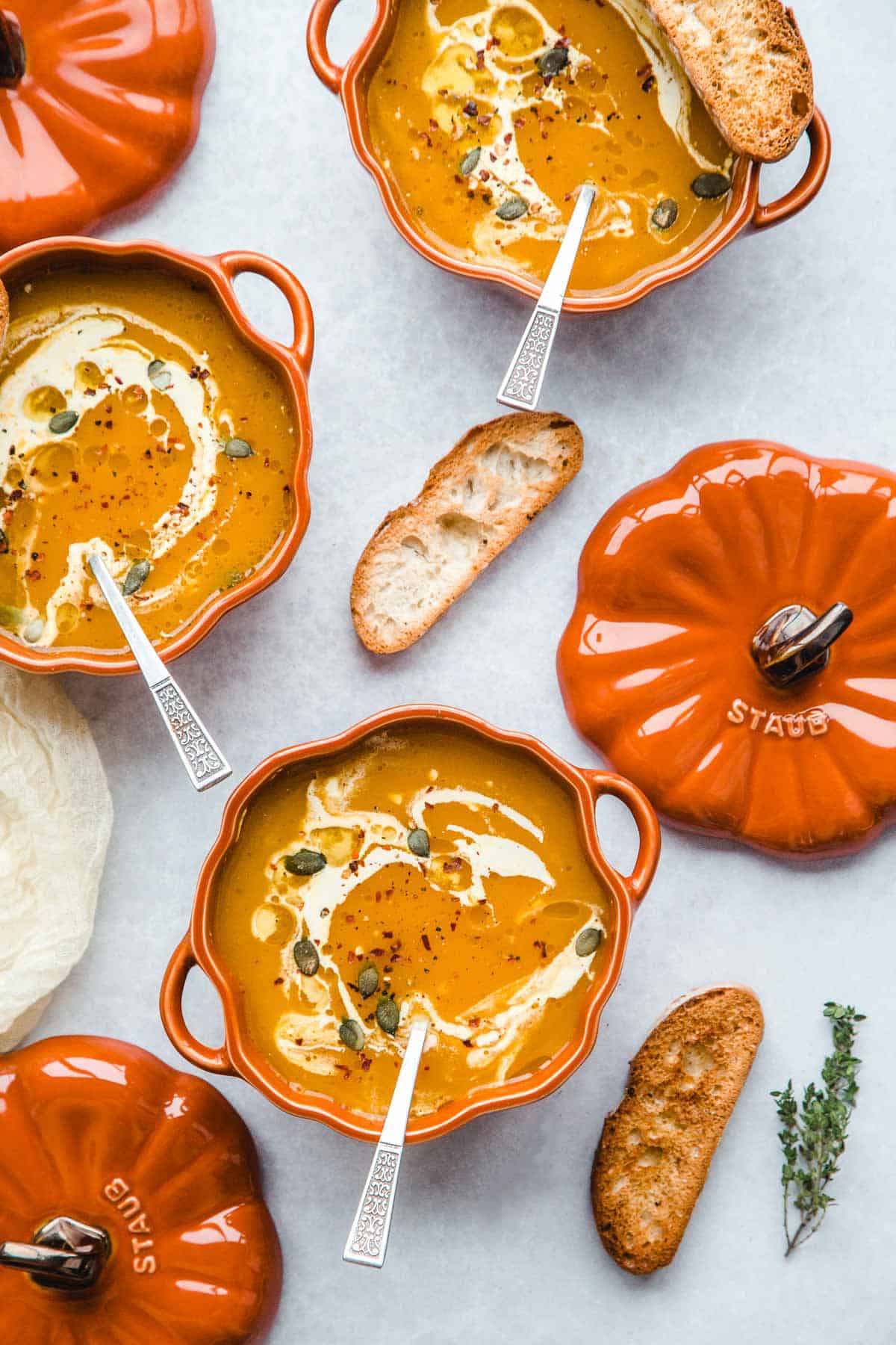3 Staub pumpkin cocottes with Vegan Pumpkin Soup and toasted bread