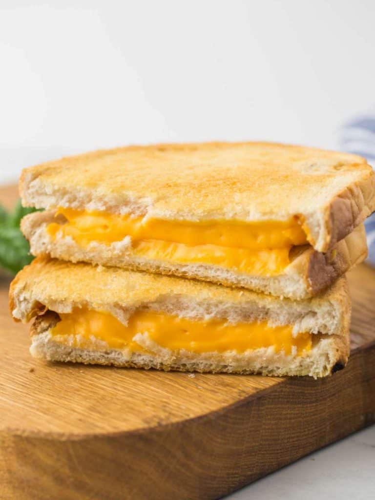 Air Fryer grilled cheese on a wooden board