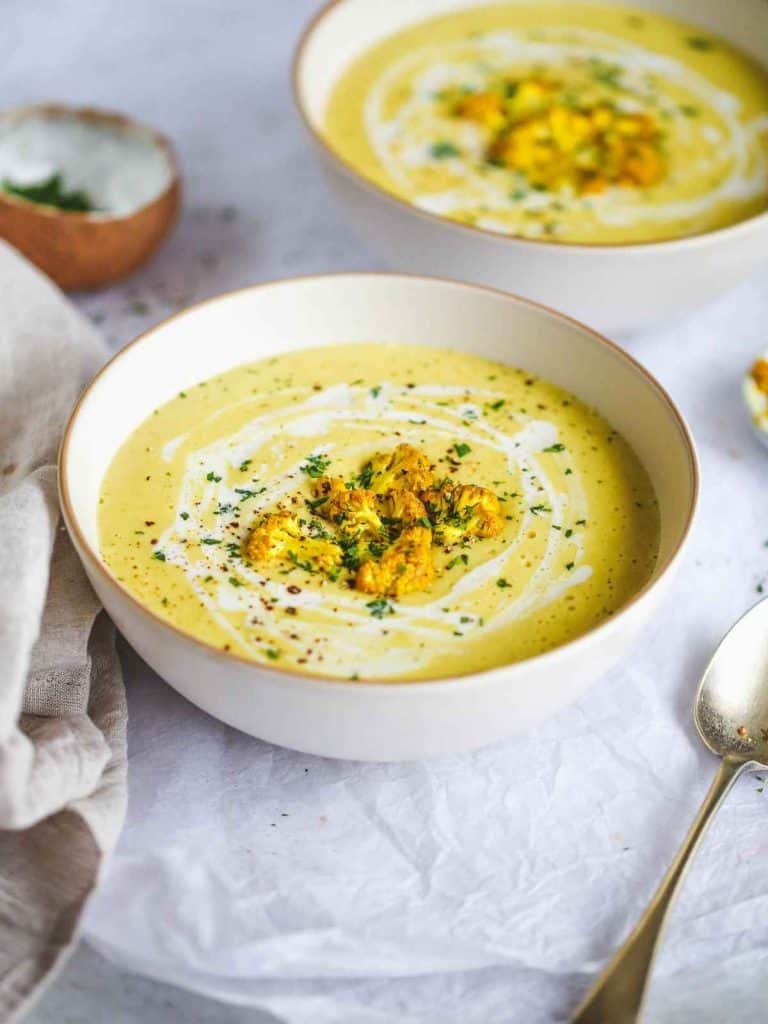 Two bowls of Curried Cauliflower Soup