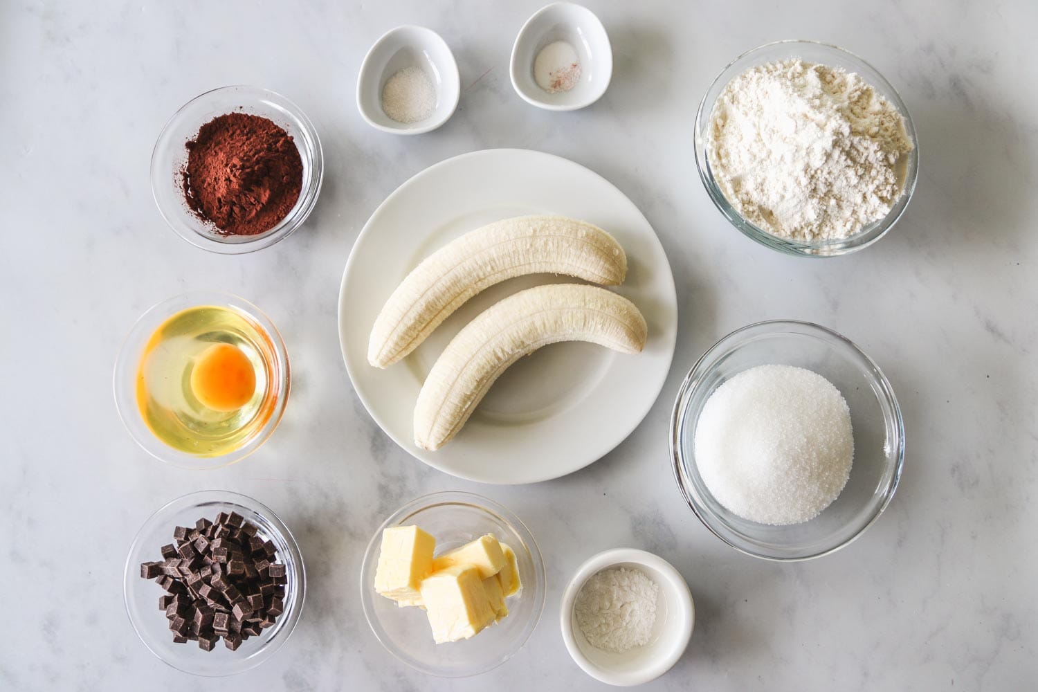 Ingredients needed to make chocolate banana muffins