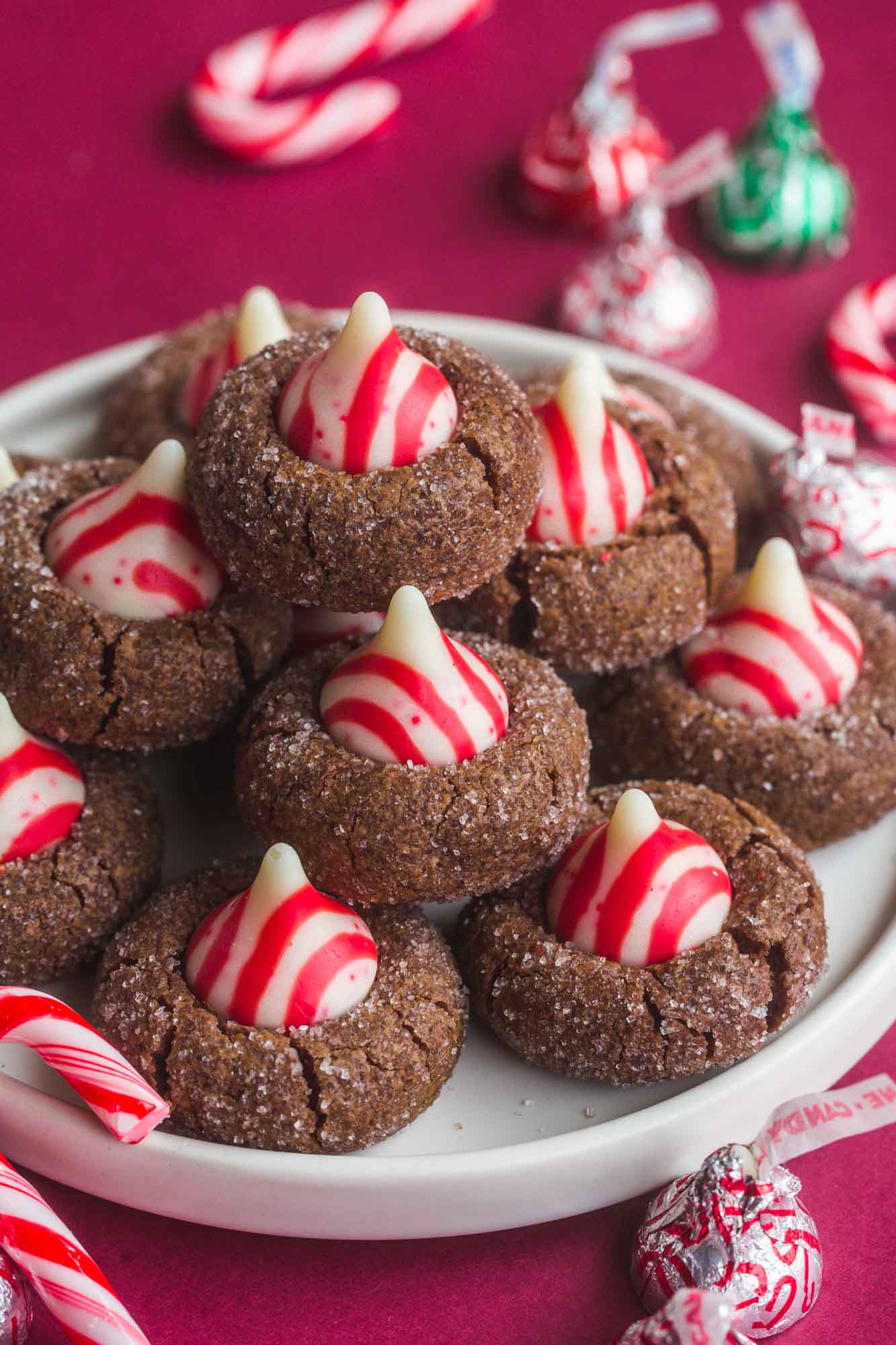Festive Chocolate Peppermint Kiss Cookies on a white plate 