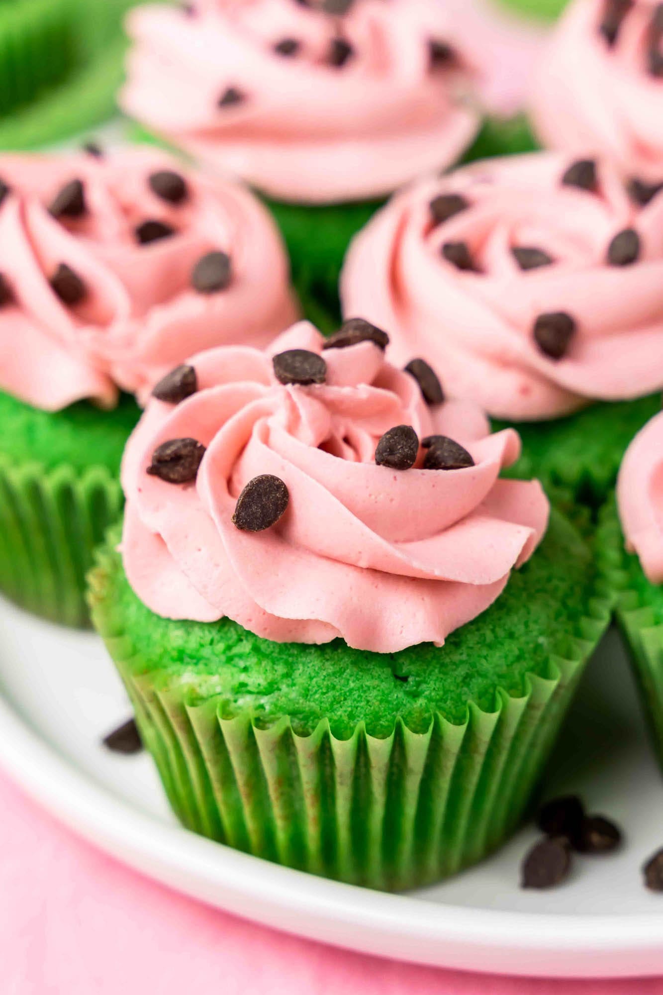 Watermelon like cupcakes with mini chocolate chips as seeds