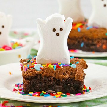 Ghost peep on top of a frosted brownie with sprinkles