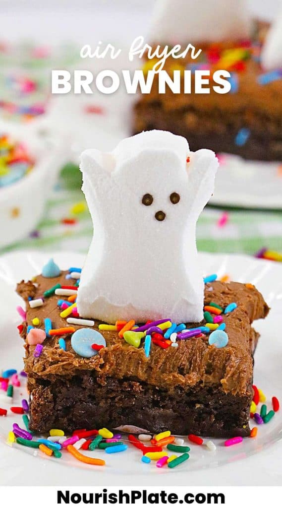 Ghost peep on top of a frosted brownie with sprinkles, and overlay text that says "Air Fryer Brownies"