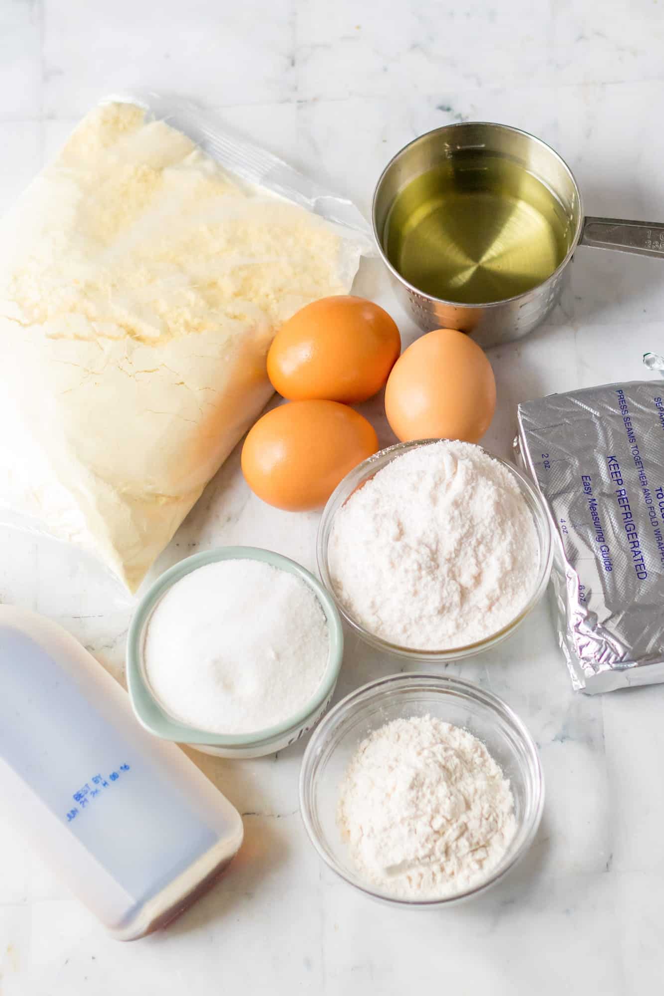 Ingredients needed to make a lemon cheesecake loaf using cake mix and instant pudding