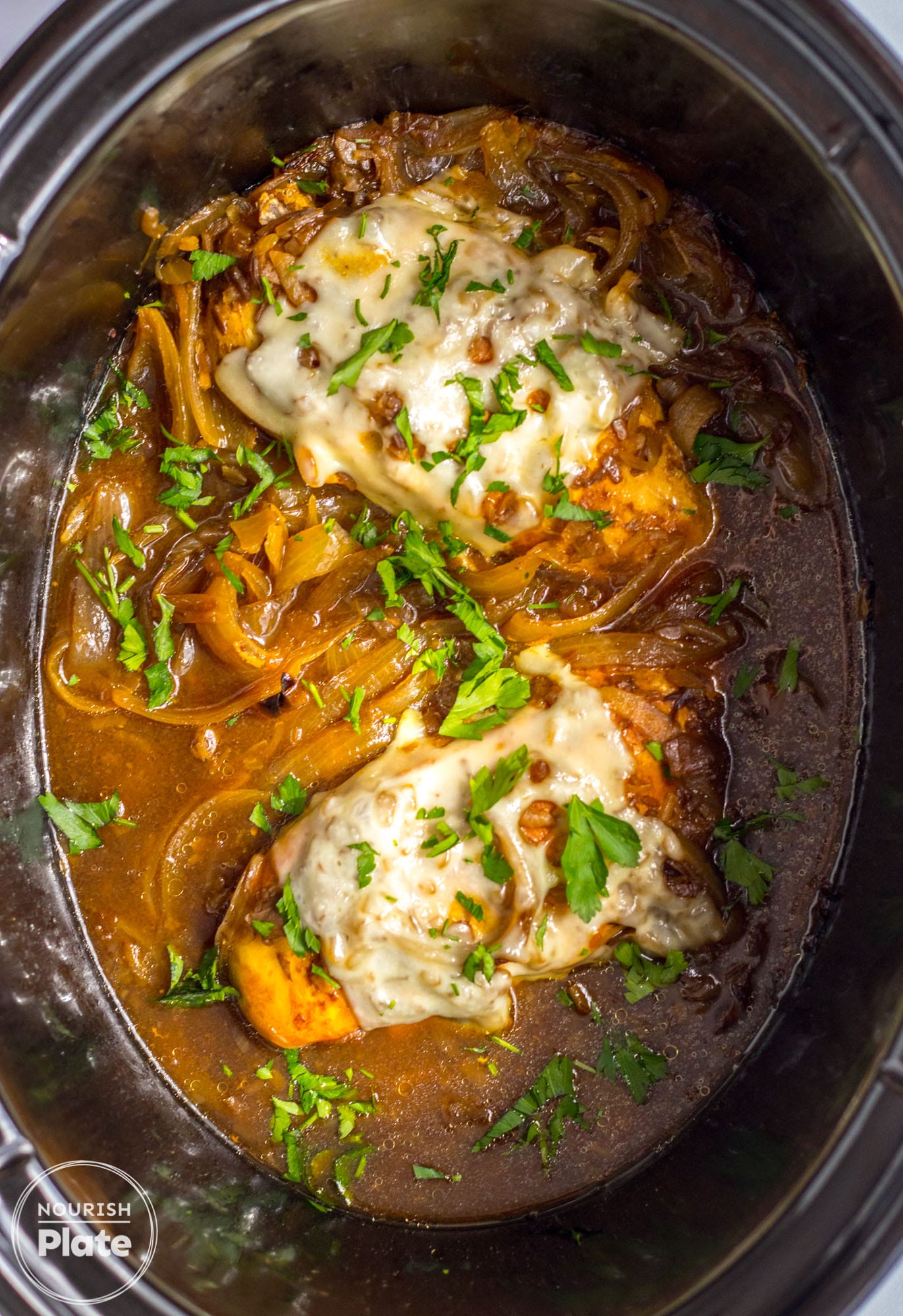 Overhead shot of french onion chicken in the slow cooker