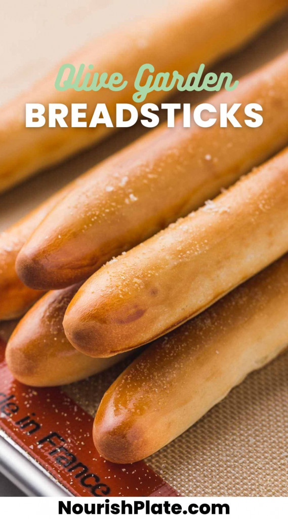 Stacked breadsticks on a silicone mat, with overlay text that says "Olive Garden breadsticks"