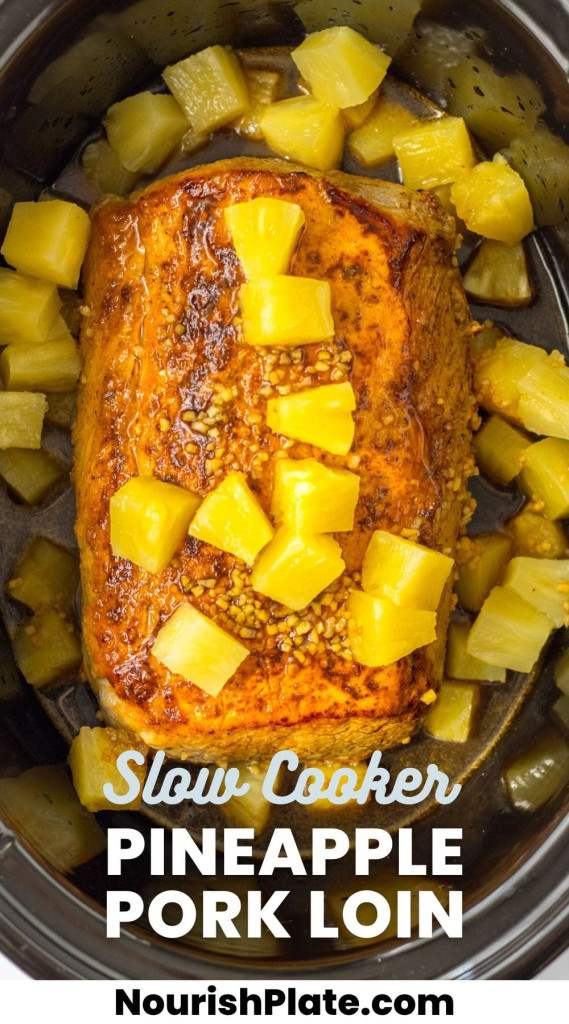 Overhead shot of a pork loin with diced pineapple in a slow cooker, and overlay text that says "slow cooker pineapple pork loin"