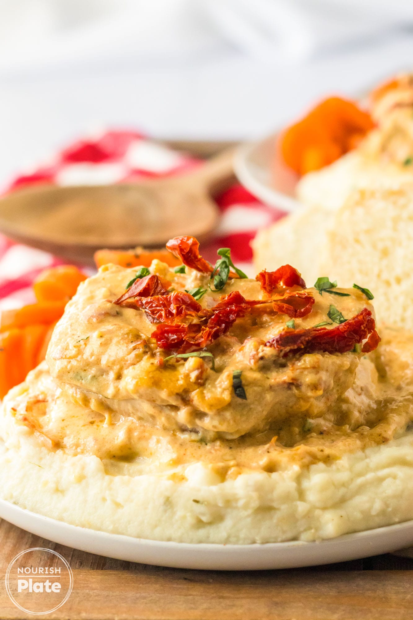 Creamy pork chops served over the mashed potatoes