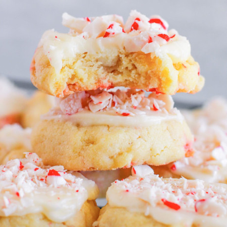 Stacked White Chocolate Peppermint Cookies showing a bite shot