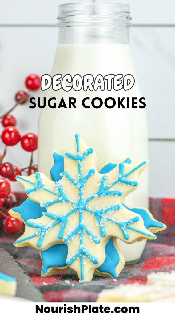 2 decorated sugar cookies shaped like snowflakes, and overlay text that says "decorated sugar cookies"