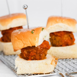 Meatball sliders on a white background