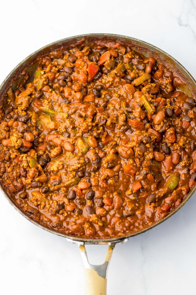 Beef chili mixture in a skillet