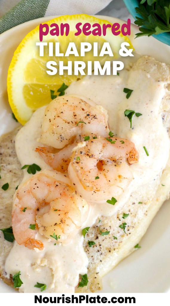 Pan Seared Tilapia and Shrimp on a plate, with a creamy sauce, and fresh lemon slices. And overlay text that says "pan seared tilapia & shrimp"