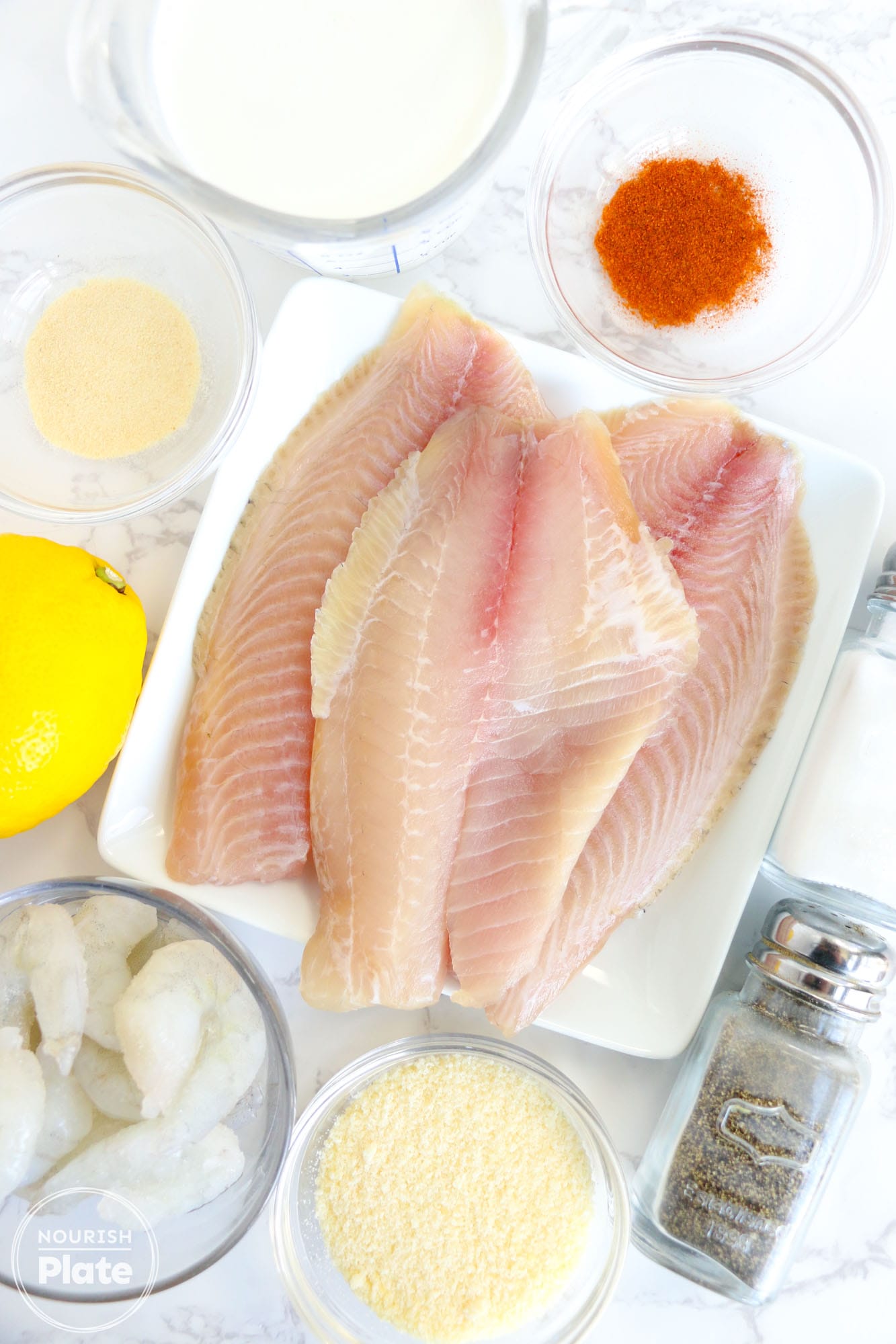 Ingredients needed to make pan seared tilapia and shrimp