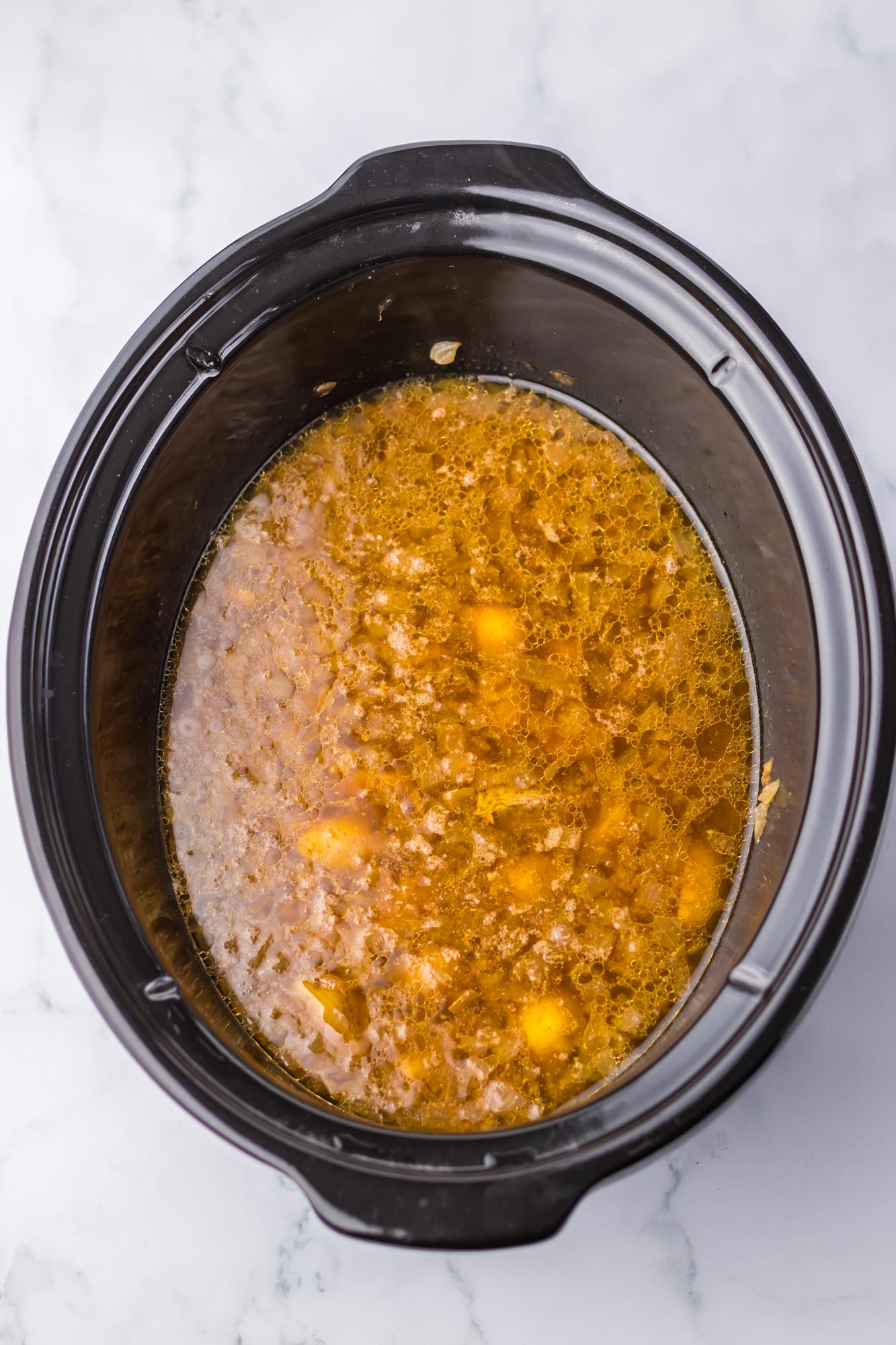 Beef broth in a slow cooker