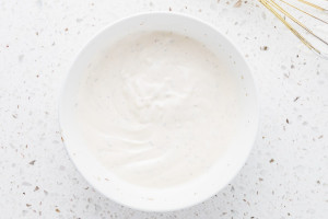 Mixed white dressing in a white bowl